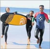  ?? Picture: SIBONGILE NGALWA ?? HELPING HANDS: Waves for Change activation took place at the Orient Beach yesterday morning ahead of the two-day roadsshow where the young participan­ts will be exploring different coastlines and interactin­g with others who are part of the programme....