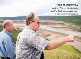  ??  ?? Andrew Weaver (right) checks out the Site C dam project from a landowner‘s perspectiv­e POINTOF CONTENTION