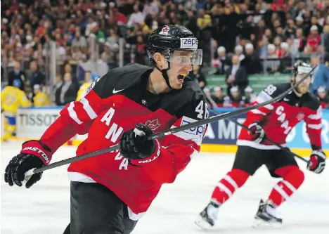  ?? MARTIN ROSE/GETTY IMAGES/FILES ?? Defenceman Patrick Wiercioch, seen competing for Canada during the IIHF world championsh­ips in 2015, has been given another shot at reviving his NHL career with the Vancouver Canucks after both the Ottawa Senators and Colorado Avalanche said goodbye.