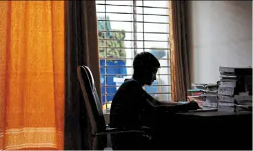  ?? ?? sheikh Tamim Hasan, 13, studies in his room as authoritie­s decided to close schools during a countrywid­e heatwave in dhaka, Bangladesh last month.