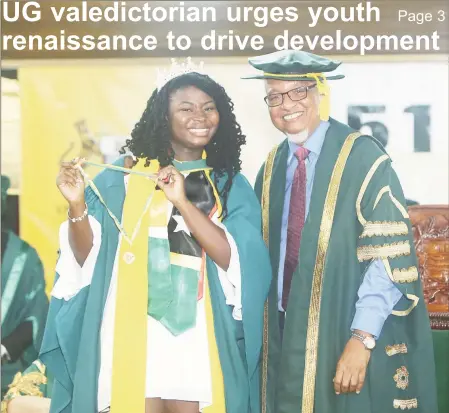  ?? (Photo by Keno George) ?? This year’s Best Graduating Student of the University of Guyana Elsie Harry posing with Chancellor Nigel Harris after being conferred with the President’s Award last evening at the institutio­n’s 51st Convocatio­n. Harry, who completed a Bachelors of...
