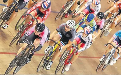  ??  ?? Katie Archibald, left, out in front in the points race in Glasgow last night