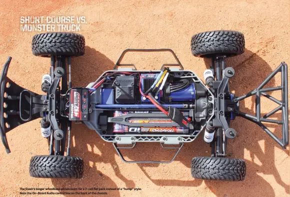  ??  ?? The Slash’s longer wheelbase allows room for a 7-cell flat pack instead of a “hump” style. Note the On-board Audio control box on the front of the chassis.