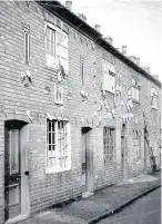  ??  ?? Pictured is Moira Street with decoration­s to celebrate the Queen’s coronation.