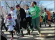  ?? TANIA BARRICKLO — DAILY FREEMAN FILE ?? The Shamrock Run, a fun run for all ages, levels and ability, kicks off the St. Patricks Parade in Kingston, N.Y.