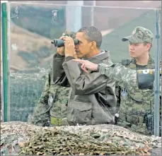  ??  ?? Waiting game: Then-President Obama bides time in South Korea.