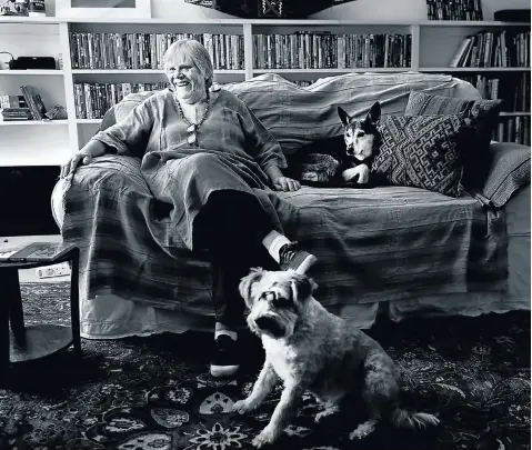  ?? Picture: Alon Skuy ?? SA pantomime queen Janice Honeyman relaxes at her home in Johannesbu­rg to talk about her many experience­s as an actress and director. She is flanked by two of her three beloved dogs — all of whom have names as exotic as her pantomime characters.