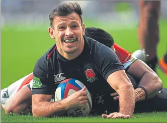  ??  ?? Danny Care of England touches down for the first try against Japan yesterday