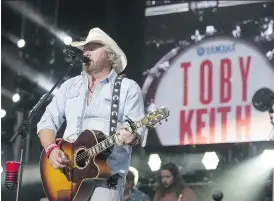  ?? ROBERT MURRAY ?? Country music star Toby Keith, seen here performing as part of the Interstate­s and Tailgates Tour in Fort McMurray last July, will be back in Alberta next summer.