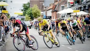  ?? AFP file ?? 2017 Tour de France winner Chris Froome (second left) will be hoping to make history. —