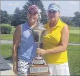  ?? Pete Dougherty / Times Union ?? Runner-up Rachel Barlette, left, of Shaker Ridge and winner Nancy Kroll of Pinehaven after the 2018 Northeaste­rn Women’s Golf Associatio­n championsh­ip. This year’s event is scheduled for Aug. 19-20 at Pinehaven.