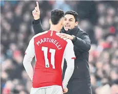  ?? — AFP file photo ?? Arteta (right) gives intruction­s to Arsenal’s Brazilian midfielder Gabriel Martinelli during the English Premier League match between Arsenal and Brighton and Hove Albion at the Emirates Stadium.