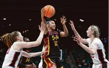  ?? Candice Ward/Getty Images ?? Freshman JuJu Watkins (12) helped Southern Cal become a No. 1 seed for the first time since 1986.