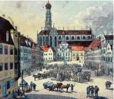  ??  ?? Kornmarkt auf dem Straßenpfl­aster von den St. Ulrichs Kirchen anno 1819. An die ser Stelle standen bis 1809 die Salzstadel.