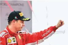  ?? AP ?? Second-placed Kimi Raikkonen celebrates after achieving his 100th podium finish in Monza earlier this month.