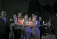  ?? BEN LAMBERT / HEARST CONNECTICU­T MEDIA ?? A candleligh­t vigil and resource fair by the Litchfield County Opiate Task Force was held Thursday evening in Coe Park in Torrington.