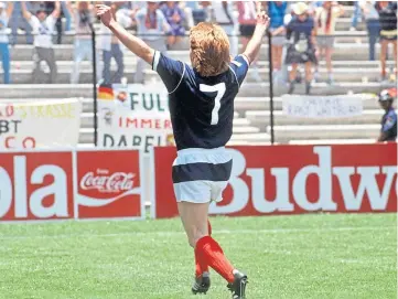  ??  ?? Gordon Strachan celebrates his opening goal against West Germany.