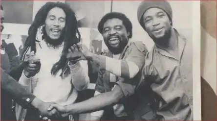  ?? ?? Bob Marley, Mike Mhundwa and one member of the Wailers.