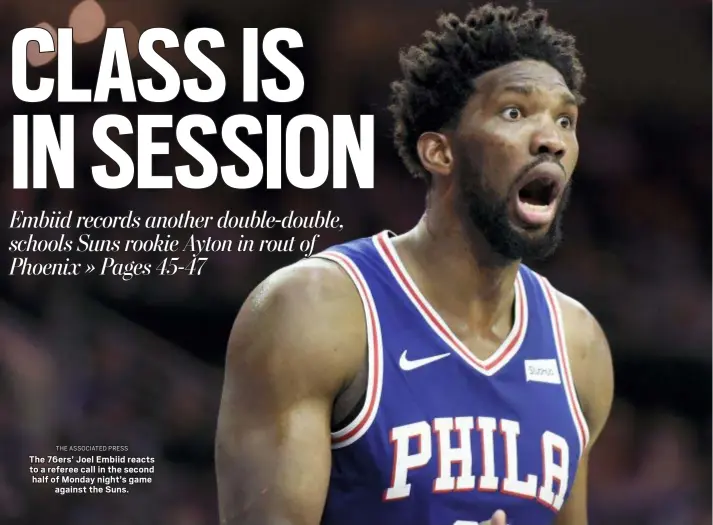  ?? THE ASSOCIATED PRESS ?? The 76ers’ Joel Embiid reacts to a referee call in the second half of Monday night’s game against the Suns.