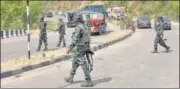  ?? ANI ?? Security personnel cordon off an area after a suspected IED was recovered from Sidra area of Jammu on April 28.