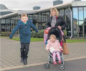  ?? Picture: Steven Brown. ?? Helga Campbell and grandchild­ren Kayla, 2, and Leon Campbell, 5, are happy with the changes taking place in Lochgelly.