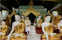  ?? — PTI ?? Prime Minister Narendra Modi during his visit to the Shwedagon Pagoda in Yangon city of Myanmar on Thursday.