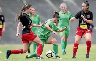  ?? WARWICK SMITH/STUFF ?? Tahlia Herman-watt of Canterbury, left, and Central’s Leah Gallie collide during their national league women’s football match at Memorial Park on Sunday.