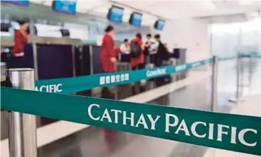  ?? EPA PIC ?? Cathay said on Wednesday in addition to 860,000 passport numbers and about245,000 Hong Kong identity card numbers, hackers accessed 403 expired credit card numbers.