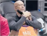  ?? MARK J. TERRILL/AP ?? Suns head coach Monty Williams, left, embraces Chris Paul as time runs out in Game 6 of the Western Conference Finals on Wednesday in Los Angeles.