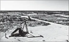  ?? DANIEL ACKER/BLOOMBERG NEWS ?? Pumpjacks operate on oil wells in the Permian basin in Crane, Texas. The region’s output has driven U.S. production.