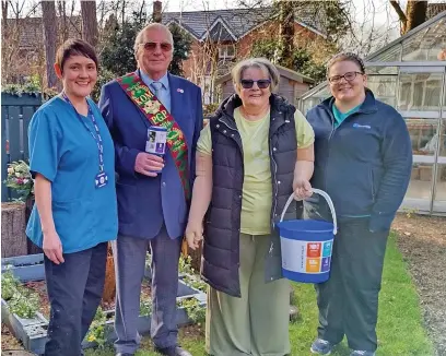 ?? ?? ●●Lisa from the Lymphoedem­a team, Pauline’s husband Ian, Pauline, and Suzanne from the counsellin­g team at St Ann’s Hospice in Heald Green.