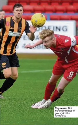  ??  ?? Top scorer Blair Henderson heads for goal against his former club