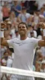  ?? ALASTAIR GRANT — THE ASSOCIATED PRESS ?? Spain’s Rafael Nadal celebrates after winning against Russia’s Karen Khachanov in their Men’s Singles Match on day five at the Wimbledon Tennis Championsh­ips in London Friday.