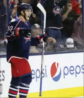  ?? THE ASSOCIATED PRESS ?? The Columbus Blue Jackets’ Alexander Wennberg celebrates his goal against the Philadelph­ia Flyers during the second period.