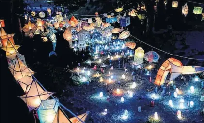  ?? TELEGRAM FILE PHOTO ?? Hundreds of people participat­ed or were spectators during the 2017 Victoria Park Lantern Festival in St. John’s.