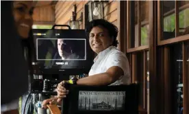  ?? Photograph: Phobymo/ Universal Pictures ?? M Night Shyamalan on the set of his new film, Knock at the Cabin.