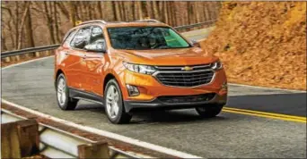  ??  ?? The all-new 2018Chevro­let Equinox is a fresh and modern SUV sized and designed to meet the needs of the compact SUV customer. Its exterior has an all-new, athletic look echoing the global Chevrolet design cues seen on vehicles such as the Cruze, Bolt...