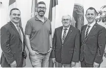  ?? COMMUNICAT­IONS NOVA SCOTIA ?? (From left) Kent Smith, Minister of Fisheries and Aquacultur­e; Colton D’Eon, of D’Eon Oyster Company; Argyle Municipal Warden Danny Muise; and Colton LeBlanc, Minister of Service Nova Scotia and MLA for Argyle.