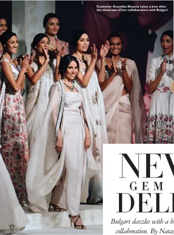  ??  ?? Couturier Anamika Khanna takes a bow after the showcase of her collaborat­ion with Bulgari