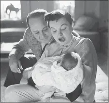  ?? Showtime/TNS ?? Sid Luft, Judy Garland and newborn Joey Luft are shown in a documentar­y about the singer’s life, Sid & Judy.