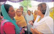  ??  ?? n Congress candidate Indu Bala (right), wife of late MLA Rajneesh Kumar Babbi, canvassing in Mukerian on Tuesday.