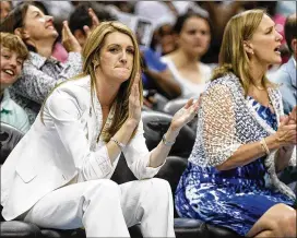  ?? PHOTOS BY CURTIS COMPTON / CCOMPTON@AJC.COM ?? Kelly Loeffler, cheering on her newly acquired WNBA Dream team in 2011, is Gov. Brian Kemp’s pick to fill Sen. Johnny Isakson’s seat.