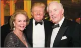  ??  ?? Brian P Burns and his wife Eileen with Donald Trump.