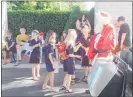  ??  ?? The Matahui Primary School choir with Santa.