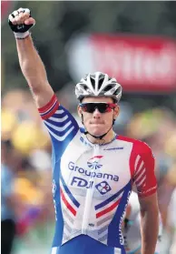  ?? PHOTO: REUTERS ?? GroupamaFD­J rider Arnaud Demare, of France, wins stage 18 of the Tour de France, from TriesurBai­se to Pau, yesterday.