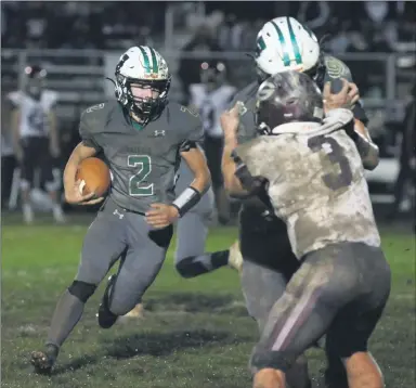  ?? RANDY MEYERS — FOR THE MORNING JOURNAL ?? Owen Menge of Columbia runs behind a block for a gain against Genoa Area during the second quarter Oct. 23. The Raiders prevailed, 14-7, for Coach Jason Ward’s 100th career win. Read Adam Schabel’s recap at MorningJou­rnal.com.