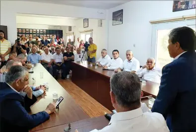  ?? ?? Prime Minister Ünal Üstel, far right, and members of his Cabinet met with national Unity Party supporters in Guzelyurt last Saturday