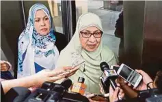  ??  ?? FAIZA menjawab soalan wartawan selepas mengadakan perbincang­an dengan Majlis Penasihat Kerajaan, semalam.