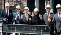  ?? Photo by Neeraj Murali ?? MILESTONE: Maha Al Gargawi, Ernst Peter Fischer, Denis Steker, Dietmar Schmitz and other officials after signing the final steel girder of the German pavilion at the Expo 2020 site in Dubai on Wednesday. —