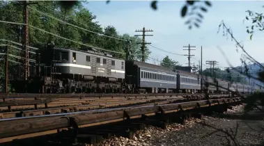  ?? ?? We made haste for North White Plains, N.Y., the location where diesels coming down from Brewster with suburban trains were swapped for electrics like Class P-2B motor No. 240.